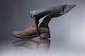 Old, damaged female boots