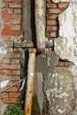 Old damaged gutter of an abandoned house Royalty Free Stock Photo
