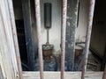 old damaged toilets in abandoned building or ruins