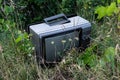 Old Damaged Tube Television Illegally Dumped On A Meadow Endangering Nature With Hazardous Substances Royalty Free Stock Photo