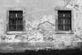 Old damaged wall with barred windows 4 Royalty Free Stock Photo