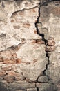 Old damaged wall with a big crack