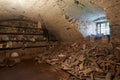 Old, dark basement with wood pile interior