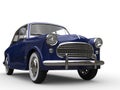 Old dark blue vintage compact car - closeup shot Royalty Free Stock Photo