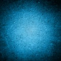 Old dark blue wall in spots, cracks, stains. Painted concrete wall in abstract grunge style. Grunge loft background texture for ba Royalty Free Stock Photo