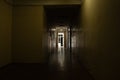 An old dark corridor is long in an office building in the city center in Ukraine, a door to the corridor, an exit, a Royalty Free Stock Photo