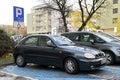 Old vintage black green coupe car Daewoo Lanos licence production from Poland parked