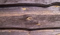 Old Dark rough wood surface with splinters and knots. Royalty Free Stock Photo