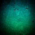 Old dark turquoise wall in spots, cracks, stains. Green painted concrete wall in abstract grunge style. Grunge loft background tex Royalty Free Stock Photo