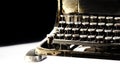 Old dark typewriter with computer mouse Royalty Free Stock Photo