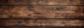 Old dark wood planks texture background, vintage brown wooden long boards of barn wall. Panoramic wide banner. Theme of rustic