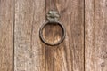 Old dark wooden door with iron handles Royalty Free Stock Photo