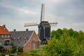 Old dark wooden wind mill in Heusden, North Brabant, Netherlands Royalty Free Stock Photo