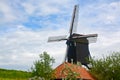 Old dark wooden wind mill in Heusden, North Brabant, Netherlands Royalty Free Stock Photo