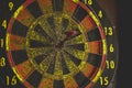 old dart board with dart arrow Royalty Free Stock Photo