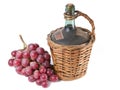 Old Decanter of Red Wine whit Grapes.