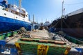 Old, decommissioned cargo boats side by side