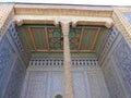 Decorated wood ceiling of an ancient madrasah of Khiva in Uzbekistan.