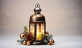 Old decorated lamp with candle and Christmas decorative ornaments. Royalty Free Stock Photo