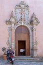 Old decorative door of a church in Erice, Sicily