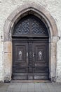 Old decorative wooden entrance door to the church Royalty Free Stock Photo