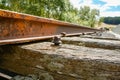 Old defunct railway line in rusted condition