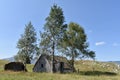 The old, delapidated abandoned shepherds traditionally built wooden huts Royalty Free Stock Photo