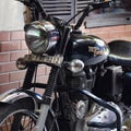 Old Delhi, India - December 9, 2019: Famous Classic Royal Enfield motorbike parked in the road, Bullet parked in the streets of ol