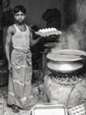 Black and white portrait of a young indian cook from the city of delhi.
