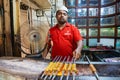 Unidentified Man grilling an Indian Chicken and Mutton Kebabs