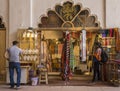 Old Delhi, Red Fort, Delhi, India-06-07-2019. Indian Backpacking Woman shopping in a souvenir shop looking to buy a Kashmiri sc