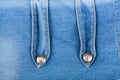 Old denim background with metal buttons Royalty Free Stock Photo