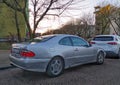 Silver grey old classic vintage veteran rusty coupe car Mercedes Benz CLK parked Royalty Free Stock Photo