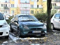 Old dented veteran scrap classic dark green small coupe car Ford Puma