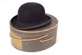 Old derby hat resting on hatbox Royalty Free Stock Photo