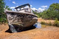Old derelict boat in mangroves