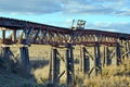 Old derelict wooden railroad bridge in countryside Royalty Free Stock Photo