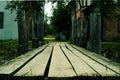 The old wooden bridge through the river