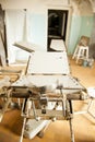 Old deserted hospital and operating table