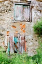 Old deserted house with wooden door