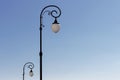 Old design Street light against blue sky background. Copy space Royalty Free Stock Photo