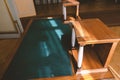 Old desk upholstered in green fabric Royalty Free Stock Photo