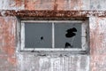 Old destroyed abandoned brick house with the broken out windows Royalty Free Stock Photo