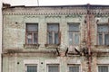 Old destroyed and abandoned ruin building. Vintage damaged house requiring repair