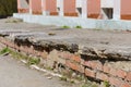 Old destroyed brick fence