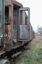 Old destroyed railway wagons. Forgotten railway station in centr