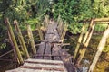 Old destroyed wooden bridge on the river Royalty Free Stock Photo