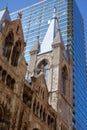 Old stone church and new Glass skyscraper