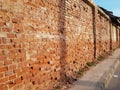 Old aged deteriorated brick wall construction