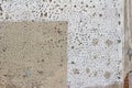 Old deteriorating wall texture showing faded and mottled paint Royalty Free Stock Photo